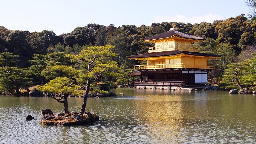 Kinkaku-ji castle next to a lake